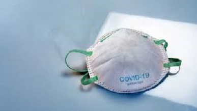 Why might face masks reduce COVID-19 severity?